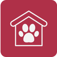 Paw print inside house icon on red background.